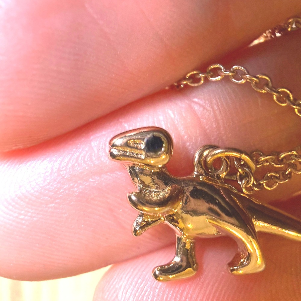 Lauren Conrad Gold Tone T-Rex Dinosaur Necklace Blue Rhinestone Eye LC Logo